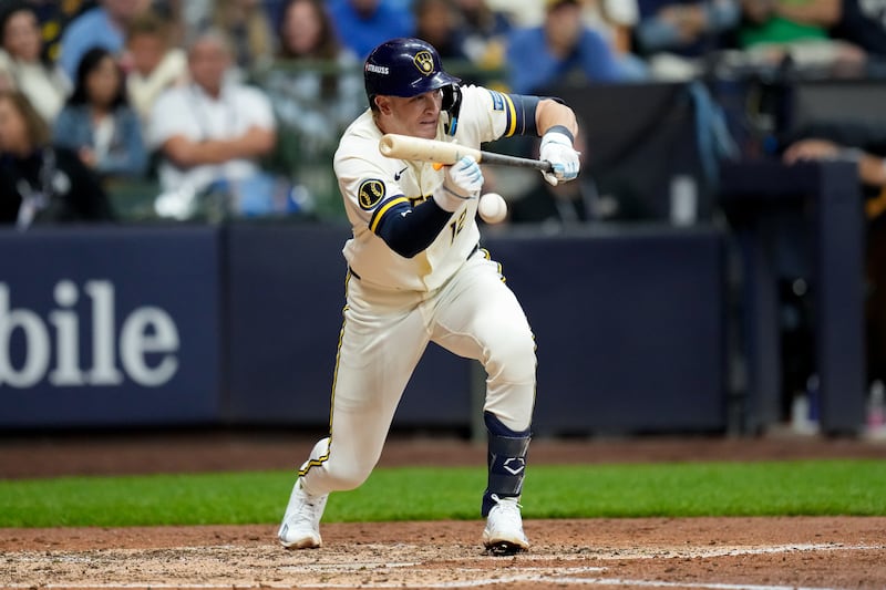 Milwaukee Brewers shortstop Cooper Pratt connects on a sacrifice bunt during the fifth inning of Game 1 of baseball's National League Championship Series between the Milwaukee Brewers and the Los Angeles Dodgers, Sunday, Oct. 11, 2026, in Milwaukee, Wisconsin.