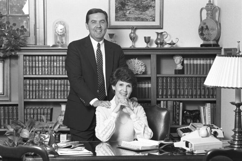 Sister Patricia T. Holland sits in her office on campus, with BYU President Jeffrey Holland, in July 1984.