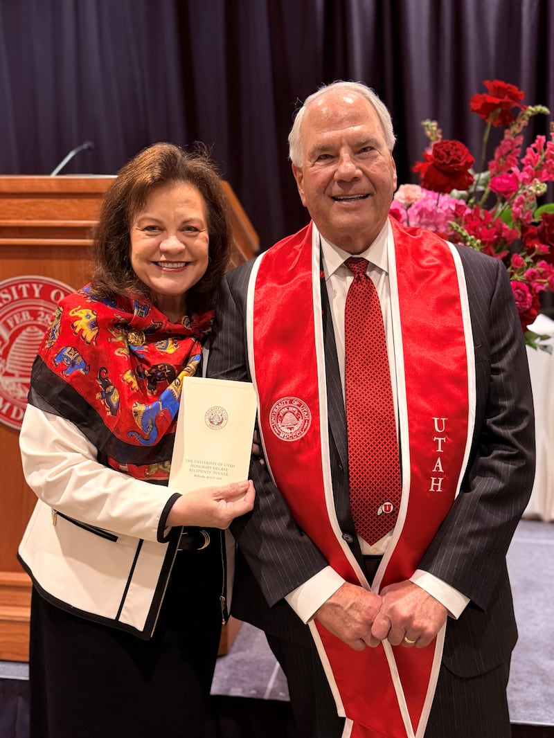 Elder Ronald A. Rasband and Sister Melanie Rasband stand together in the University of Utah's Jon M. Huntsman Center in Salt Lake City on Wednesday, April 29, 2026.
