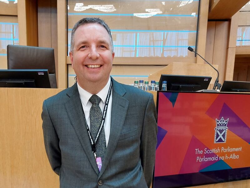 President Paul Rand of the Dundee Scotland Stake smiles before giving his "Time of Reflection" address in the Scottish Parliament Meeting on Sept. 23, 2025, in Edinburgh, Scotland.