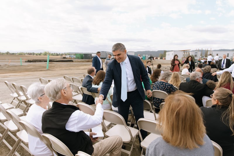 Elder Hutch U. Fale — a General Authority Seventy and member of the Church’s United States West Area presidency — greets attendees at the groundbreaking ceremony for the Coeur d’Alene Idaho Temple on Saturday, Aug. 29, 2026, in Coeur d’Alene, Idaho.